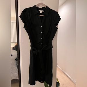 Black cotton short sleeve knee length dress.